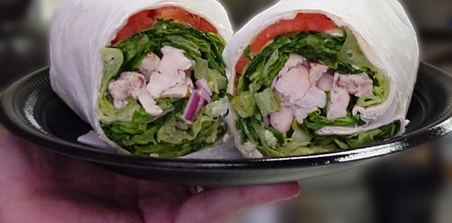 Cycle menu choice of fresh salad wrap served up fresh on a plate as a healthy meal solutions